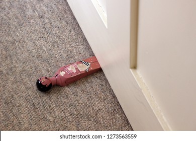 Wooden Doorstop, Male Figure