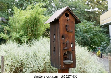 Wooden Double Storey Bird House In The Garden