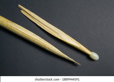 Wooden Drum Stick On A Black Background. Broken Drum Stick