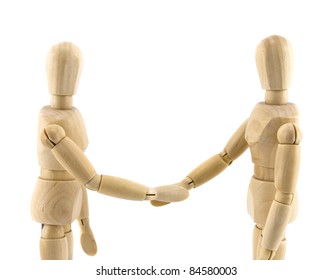 Wooden dummies shaking hands, Cooperation of business - Powered by Shutterstock