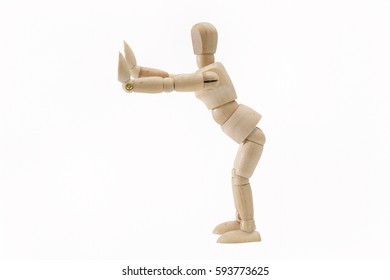 Wooden dummy pretending push something isolated on white background. - Powered by Shutterstock