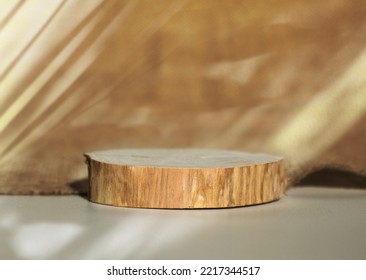 Wooden Eco Rustic Pine Tree Circle Disc Platform Podium On Light And Shadow Background. Minimal Empty Display Product Presentation Scene.