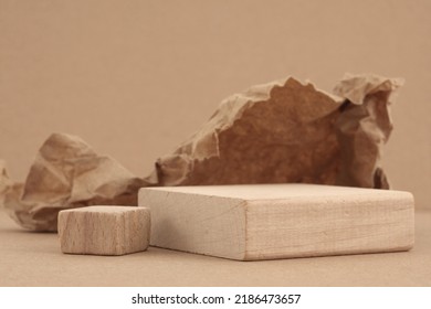 Wooden Eco Rustic Platform Podium And Kraft Paper On Beige Background. Minimal Empty Display Product Presentation Scene.