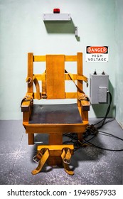 Wooden electric chair for death sentence in prison cell concept