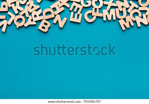 Wooden english letters background, copy\
space. Alphabet study, abc, education\
concept