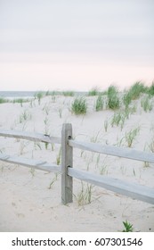 Wooden Fence Post At The Beach