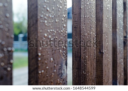 Similar – slats on the fence