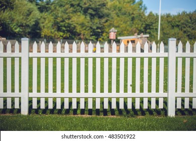 Wooden fence in white color in the park