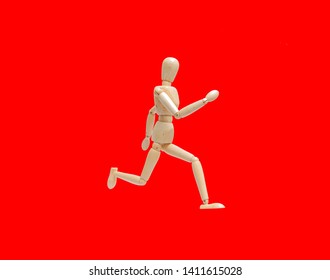 Wooden figure doll pose running on red background  - Powered by Shutterstock