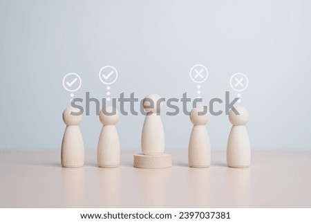 Wooden figures peg dolls stand above wooden circle among others with vote yes or no symbol. Open-mindedness or public hearing, volunteers, candidates, constituency electorates, and elections concept. 