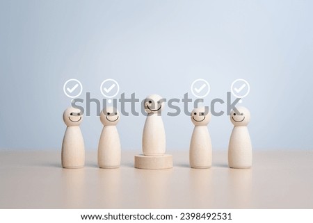 Wooden figures peg dolls stand above wooden podium among others with vote yes symbol. Open-mindedness, public hearing, elections. Volunteers, candidates, community representative.