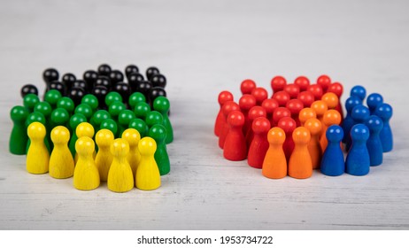 wooden figurines in the colors of German political parties, Green Party, FDP and Christian Democratic Union as government coalition and other parties as opposition - Shutterstock ID 1953734722