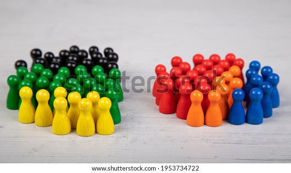 wooden figurines in the\
colors of German political parties, Green Party, FDP and Christian\
Democratic Union as government coalition and other parties as\
opposition
