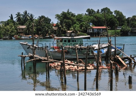wooden fisherman boat moored in port located at  Terengganu, Malaysia.