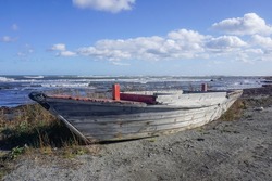 Wooden Fishing Boat On The Shore By The Sea In Sakhalin Island