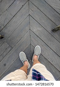 Wooden Floor And Checkerboard Shoes