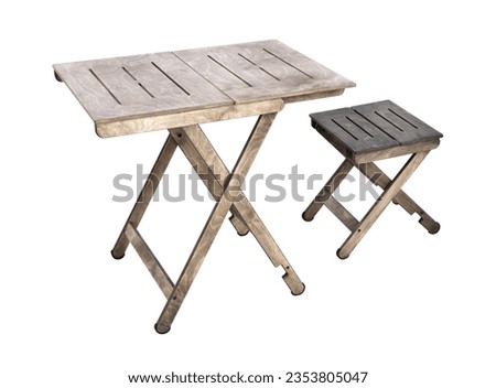 Wooden folding table and chair. On a white background. Foto stock © 