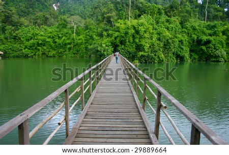 Similar – Image, Stock Photo Lake with wooden footbridges