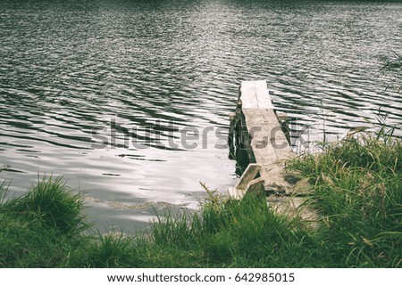 Similar – Image, Stock Photo Lake with wooden footbridges