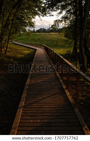 Similar – Image, Stock Photo Lake with wooden footbridges