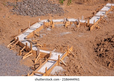 Wooden Formwork For Pouring Concrete Foundation Of The House. Foundation Construction.