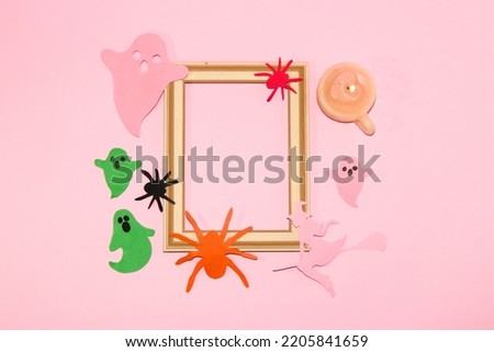wooden frame as copy space around the frame halloween mosters, creative halloween concept, copy space, flat lay