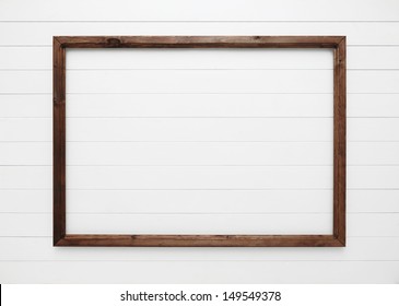 Wooden Frame On White Wall