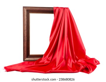 Wooden frame with red silk. On a white background.