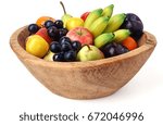 Wooden fruit bowl isolated over white background