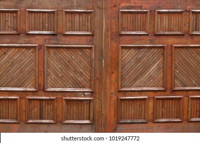 Wooden Garage Doors On An Upscale House