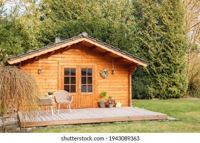 Wooden Garden Shed With Terrace. Wooden Garden Shed. Life In The Country In Germany In Summer. Vacation In The Country. 