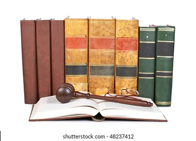 Wooden Gavel From The Court And Law Books Isolated On White Background. Shallow Depth Of Field