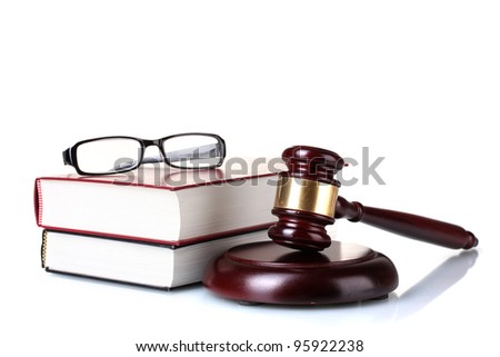 wooden gavel, glasses and books isolated on white