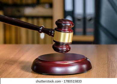 Wooden Gavel For Judges Close-up. Judgment Of Judgment Concept Of Punishment And Pardon. Symbol Of Law Is The Hammer Of Judge.