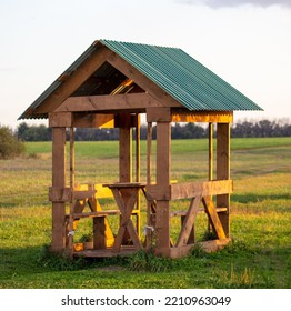 Wooden Gazebo In The Park.