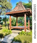 a wooden gazebo as a place to play. rest, discuss, and enjoy the warm surroundings