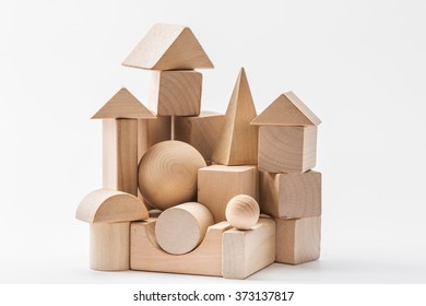 wooden geometric shapes on a white background