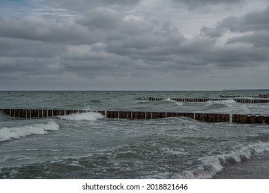 Wooden Groynes In The Baltic Sea On A Stormy Summer Day