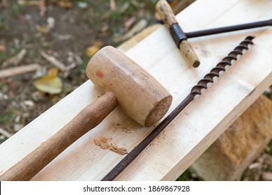 wooden hammer mallet and drill construction tool
