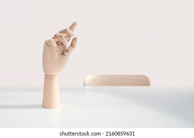 Wooden Hand On Office Desk, Front View