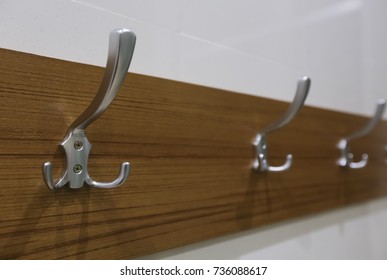 wooden hanger on wall