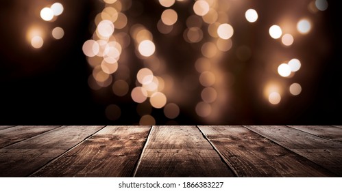 Wooden Holiday Empty Table, Night View, Blurred Bokeh Lights Background.