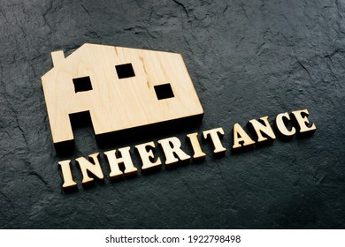 Wooden home as symbol of property and word inheritance. - Shutterstock ID 1922798498