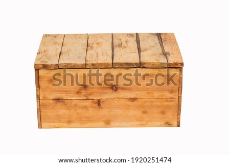 Wooden homemade chest on a white background. Interior element