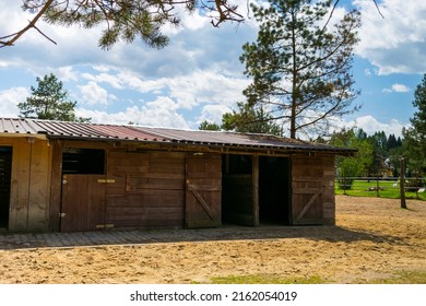 wooden horse field shelter in the mountains