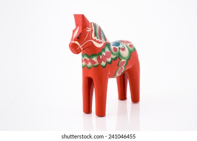 A wooden horse isolated against white.  - Shutterstock ID 241046455
