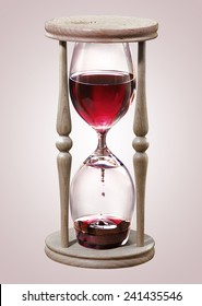 wooden hourglass filled with wine 