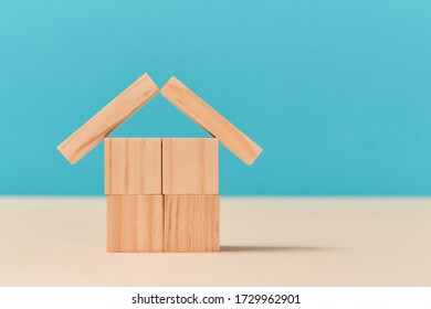 Wooden house of cubes and planks mockup style. Template for creative design, copy space. Empty blocks, place for text - Shutterstock ID 1729962901