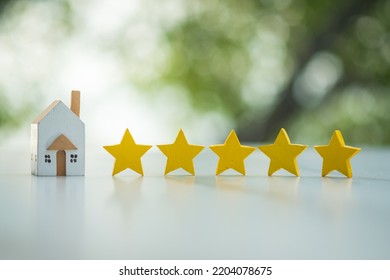 Wooden House And Five Stars. The Concept Of The Best Housing, Luxury Apartments VIP Class. The Best Service And Universal Recognition, A High Score.