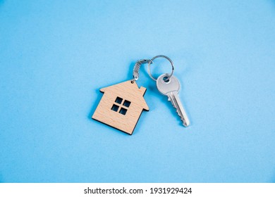 wooden house model and key 